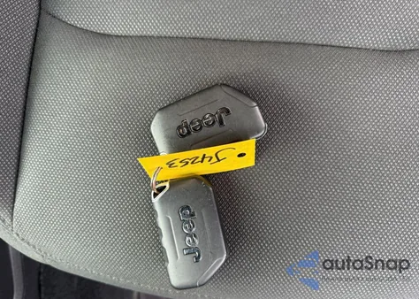 2022 Jeep Wrangler Unlimited Sahara 4X4 из США, поврежденный, VIN 1C4HJXENXNW258849